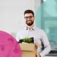Man leaving his job holding a box of personal effects