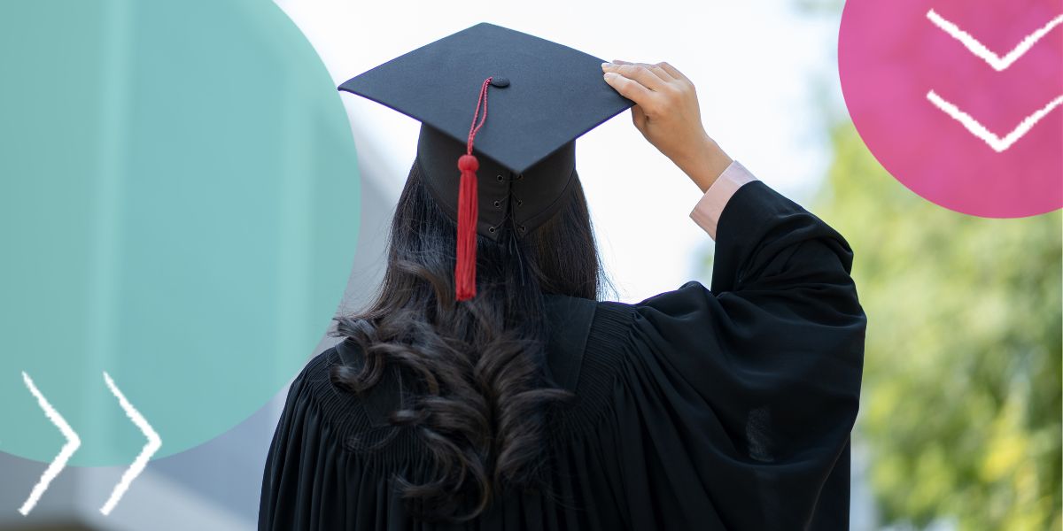 A graduate wearing a cap and gown, with their back to the camera, considering their career path after university