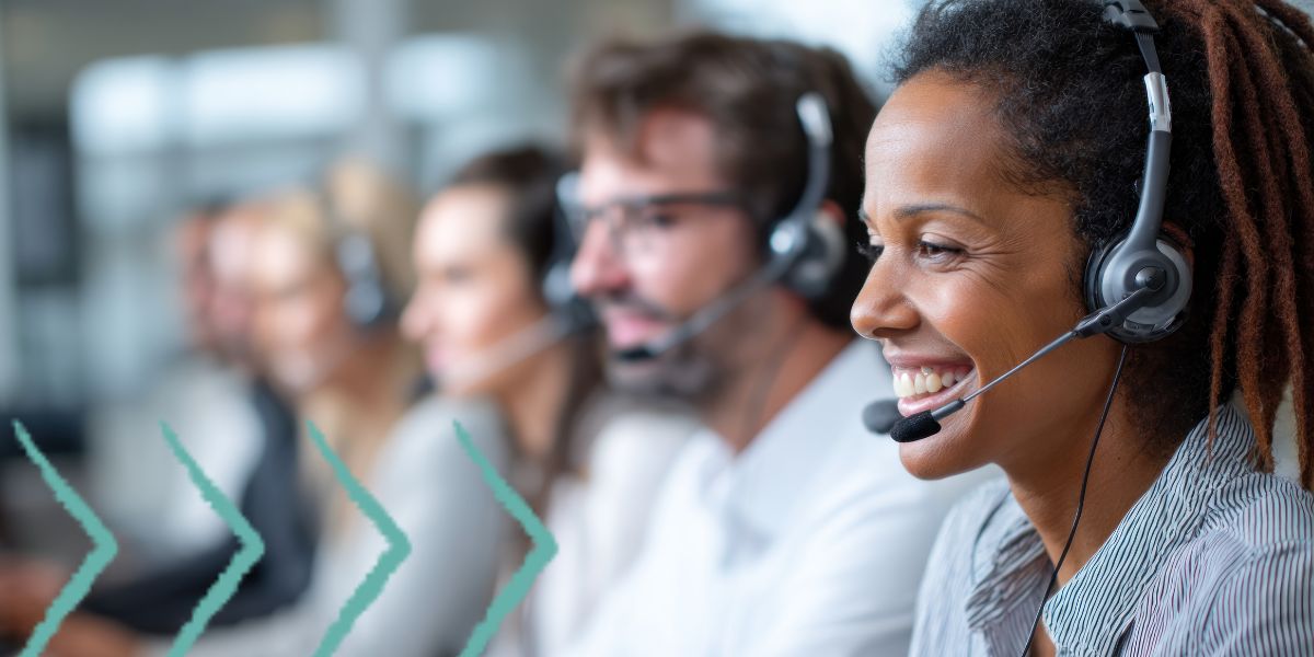 Profile view of a customer service team sat side by side
