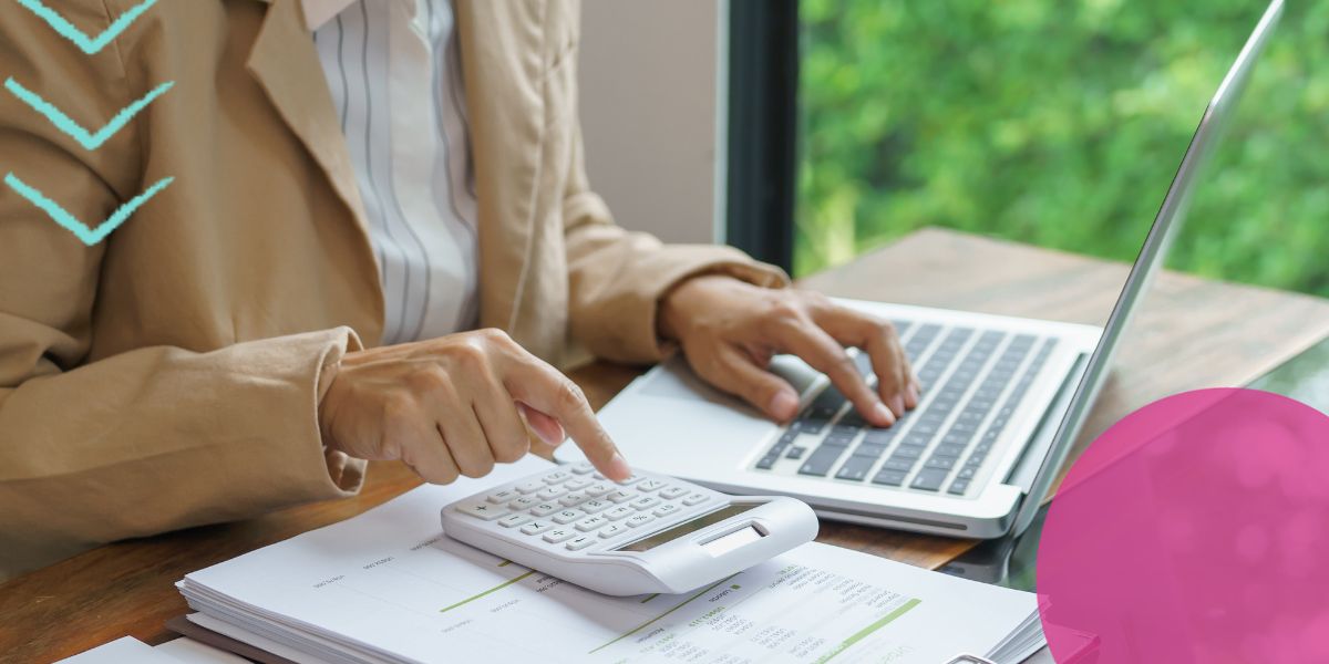 the real cost of a bad hire business owner reviewing recruitment costs on a laptop